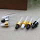 3ml factory wholesale transparent oil bottle gold ring white rubber head dropper bottle glass bottle small sample bottle