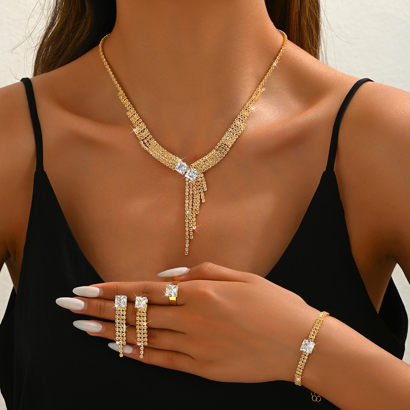 2025 Bridal Jewelry suit Fashion OL All-match Claw Chain Zircon Tassel Necklace Earrings Bracelet Ring Four-piece Set 2025 Bridal Jewelry suit Fashion OL All-match Claw Chain Zircon Tassel Necklace Earrings Bracelet Ring Four-piece Set