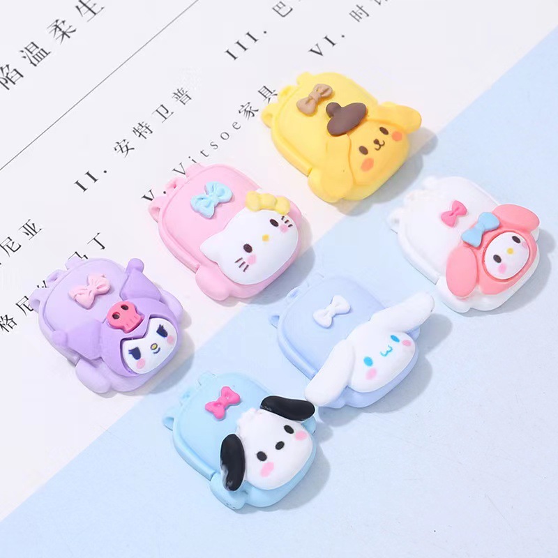 Resina de dibujos animados DIY pegamento crema caja del teléfono accesorios mochila forma melodía Pacha perro Niños Accesorios para el cabello al por mayor