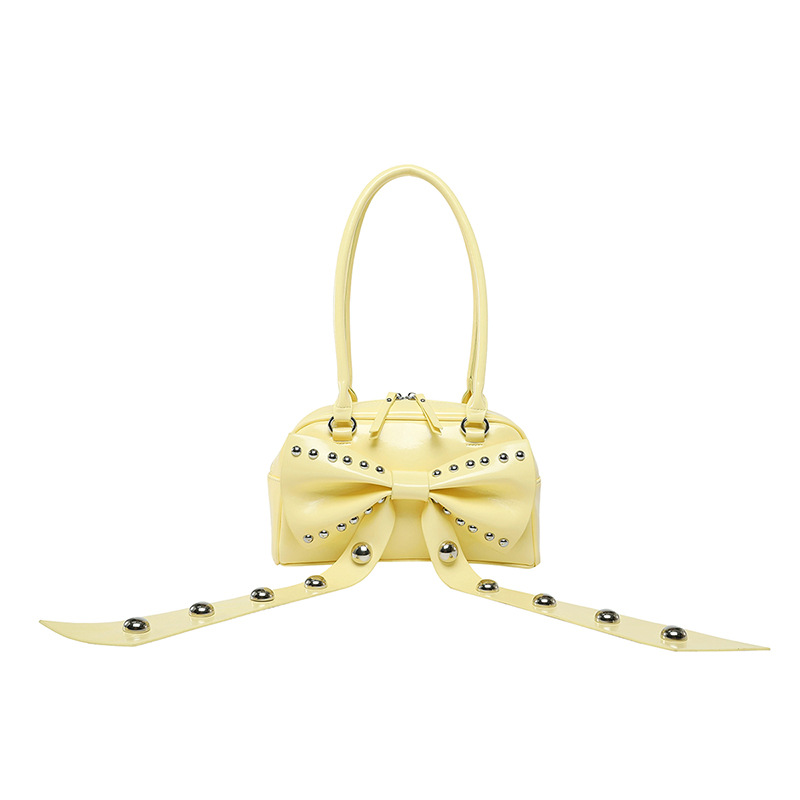 Bolso de axila de textura de alta calidad 2025 verano nuevo bolso femenino lindo lazo bolso de hombro con remache personalizado