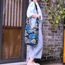 民族风包包女单肩斜挎文艺布包女包女士水桶包印花云南旅游牛仔布