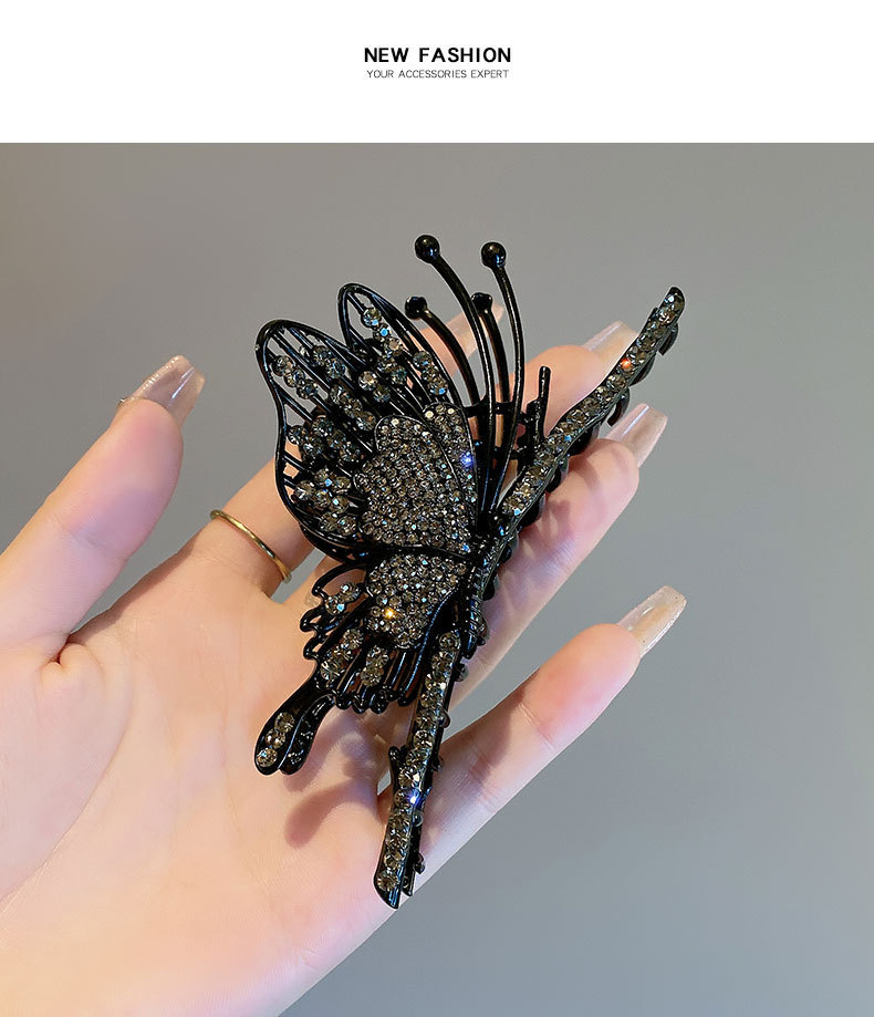 Fermaglio a farfalla nero con strass elegante accessorio capelli_voghion.com