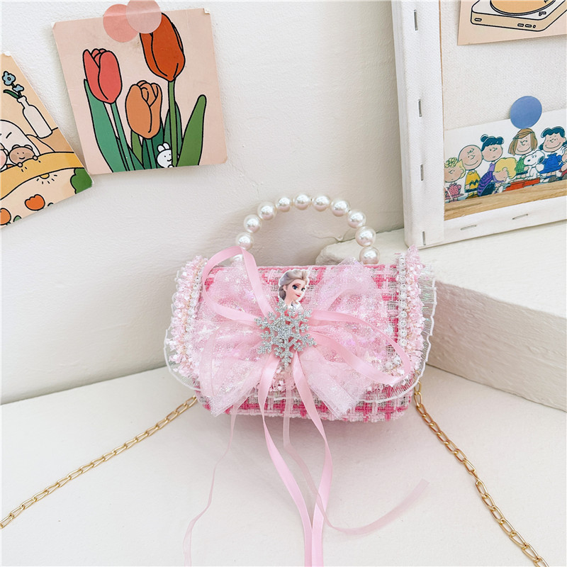 2024 nuevo bolso de moda para niños princesa perla bolso de cambio de mano cadena de chicas bolso de hombro