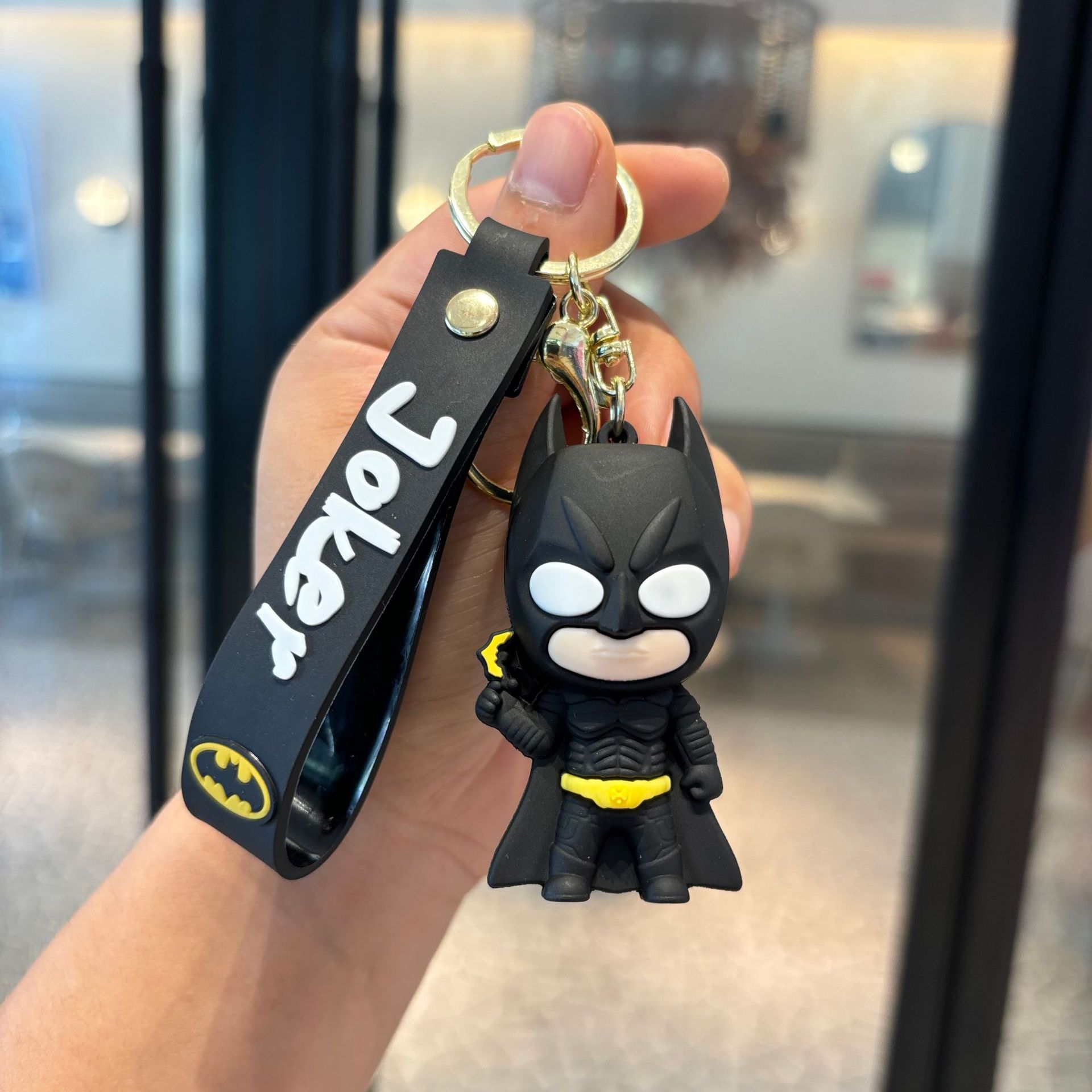 Batman cruzado superhéroes clown muñeca coche llavero colgante muñeca máquina de regalo pequeño