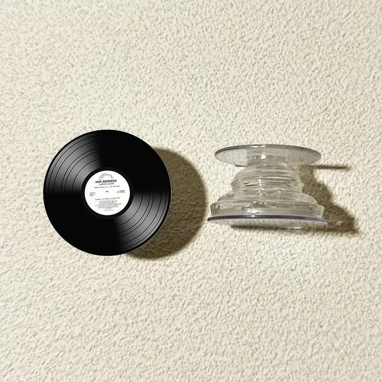 Grabación de CD vinilo redondo airbag soporte adhesivo tipo teléfono móvil adhesivo 360 ° giratorio telescópico succión magnética de corriente de marea