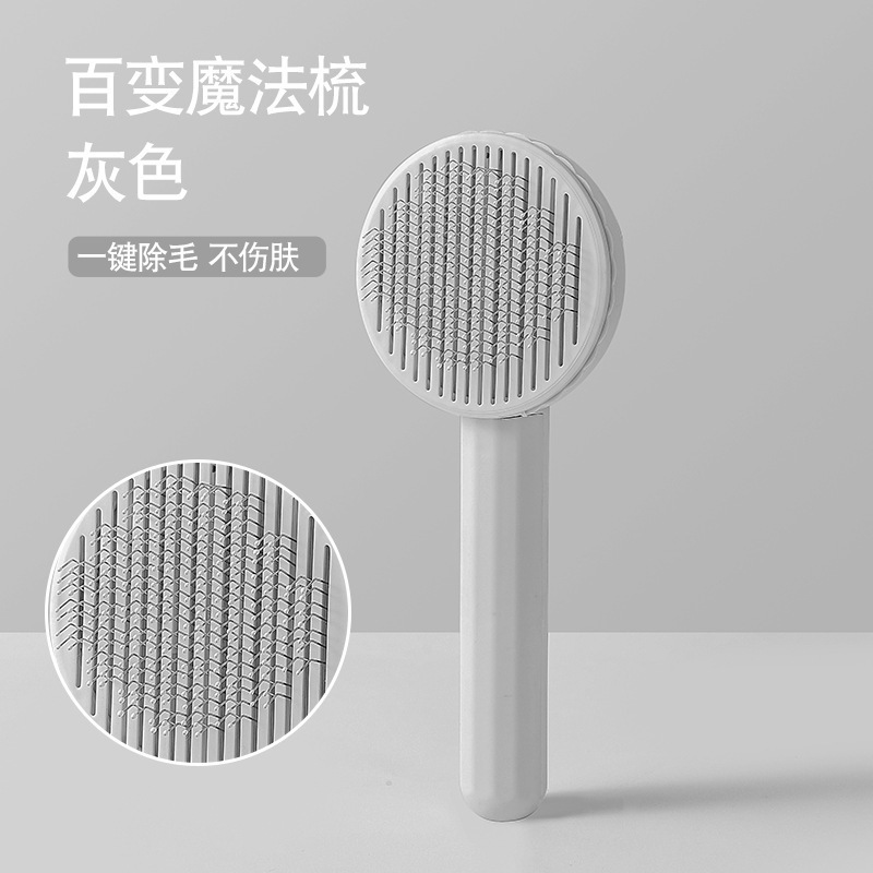 Oído de gato cabeza de oso gato peine nueva mascota gato peine flotante aguja de pelo peine suave gato fábrica de pelo en stock al por mayor