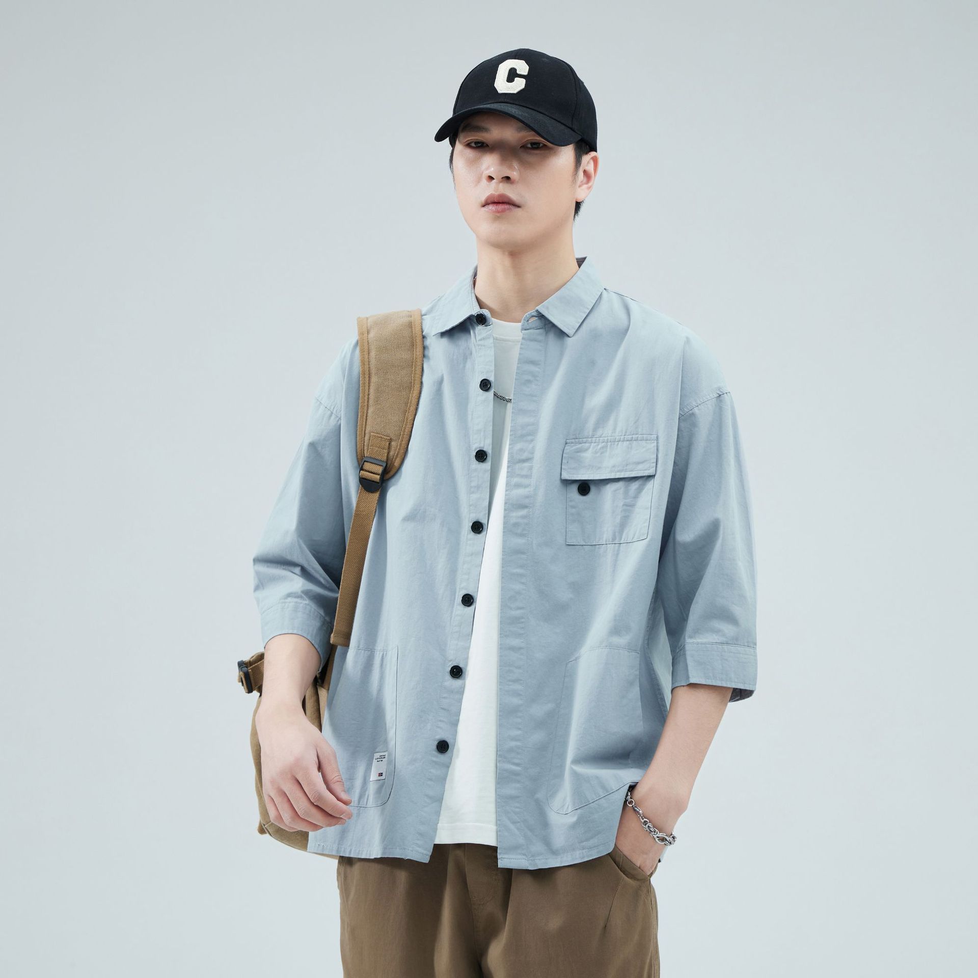 Camisa de trabajo holgada para hombre, primavera y verano, totalmente de algodón, estilo coreano, estilo americano informal, mangas tres cuartos, cuello único, bolsillo, transpirable y que absorbe la humedad.