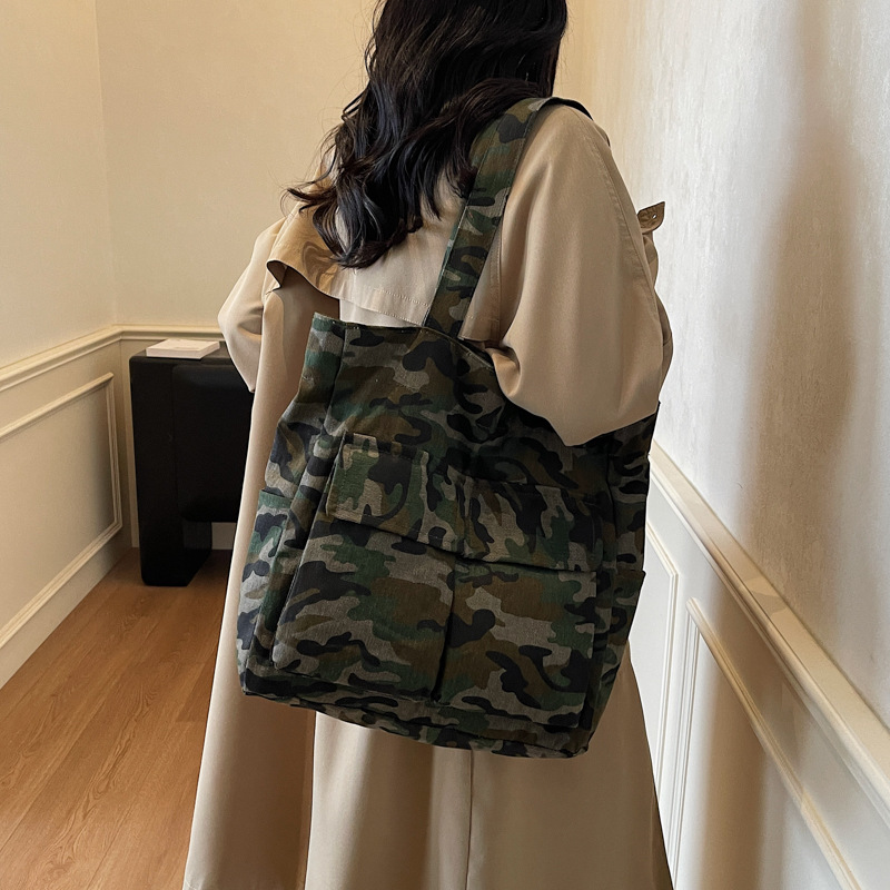 韩系ins复古迷彩包女2026新款文艺单肩腋下包百搭学生帆布托特包