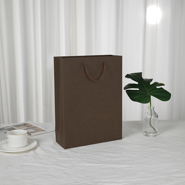 Paper bag clothing advertising bag vertical shopping gift packaging coffee brown bag in stock wholesale portable paper bag