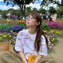 国潮牌涂鸦白色短袖t恤女夏季2025新款纯棉情侣装设计感小众上衣