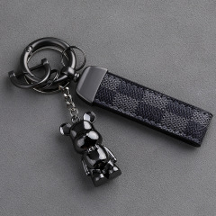 金属の暴力的な熊のキーホルダーの自動車のキーチェーンのペンダントのリュックサックの装飾品のファッションの古い花の縄感の馬蹄のボタン