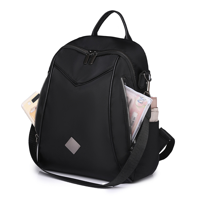 Mochila femenina 2024 nueva moda coreana de nailon de gran capacidad mochila de viaje de ocio ligero al por mayor