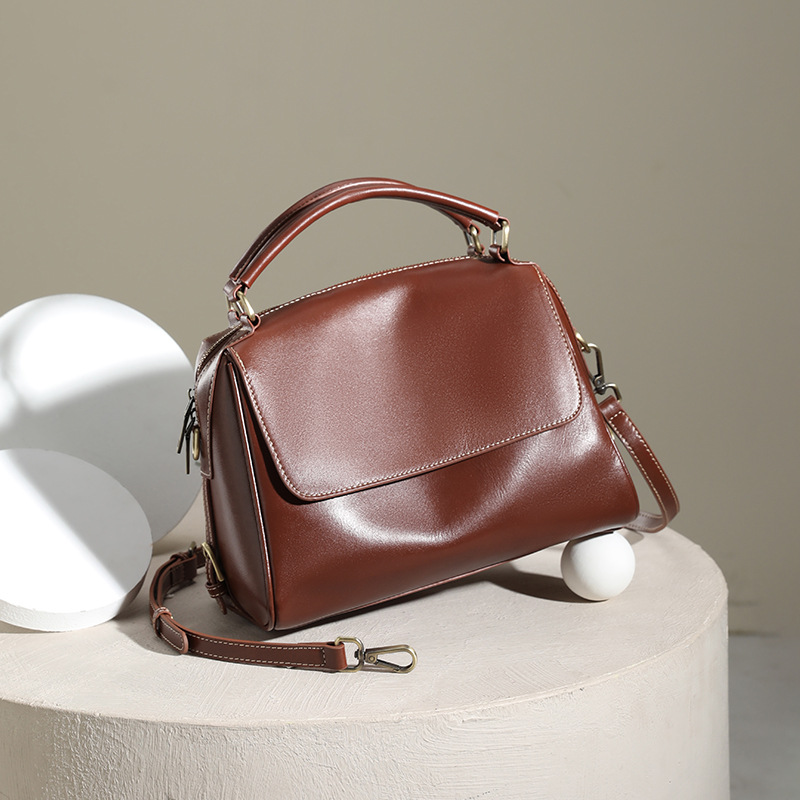 Bolso de mujer 2024 nuevo bolso de cuero versátil bolso de alta gama diseño de nicho bolso de hombro único bolso de cercanías bolso