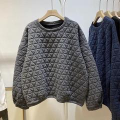 高級な菱の形の格の厚い綿の衛衣の秋冬の韓国版の新型のファッションの個性はやせている空気の綿のコートの女性の潮を現します。