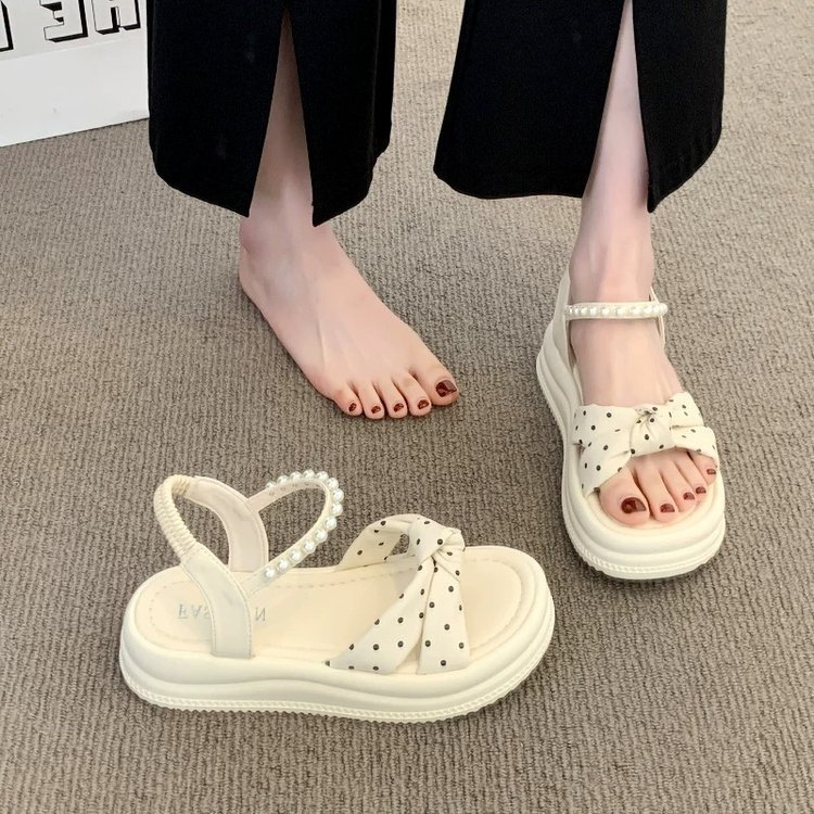 Punto de ondas de alto nivel de sensación de sandálias de suela gruesa para mujeres 2026 nuevo verano suave estilo francés de hadas zapatos de perlas romanas