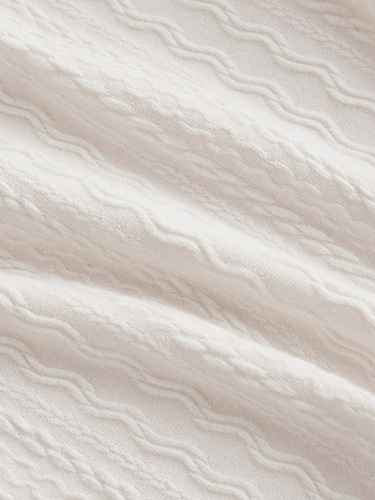 Elegant women's lace-trimmed, slim-fit, V-neck top in a milky white tone, exuding sweet, gentle, and charming temperament.
