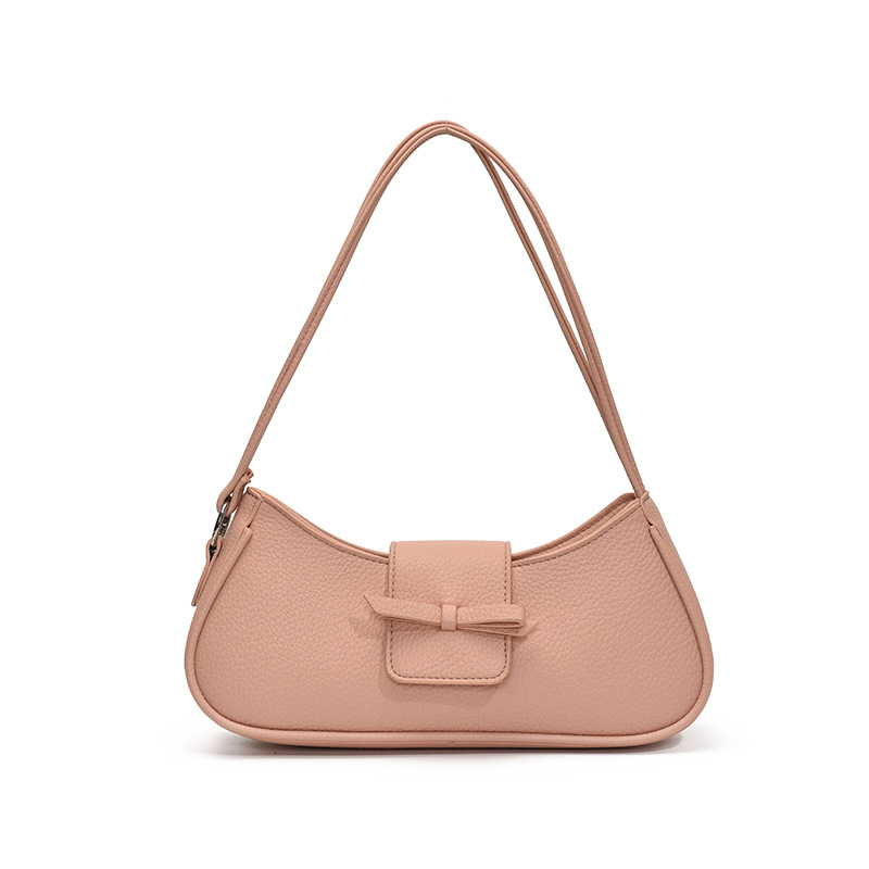 Versión coreana del bolso de axila de nicho 2025 primavera y verano nuevo bolso femenino lindo bolso de lazo bolso de hombro diario