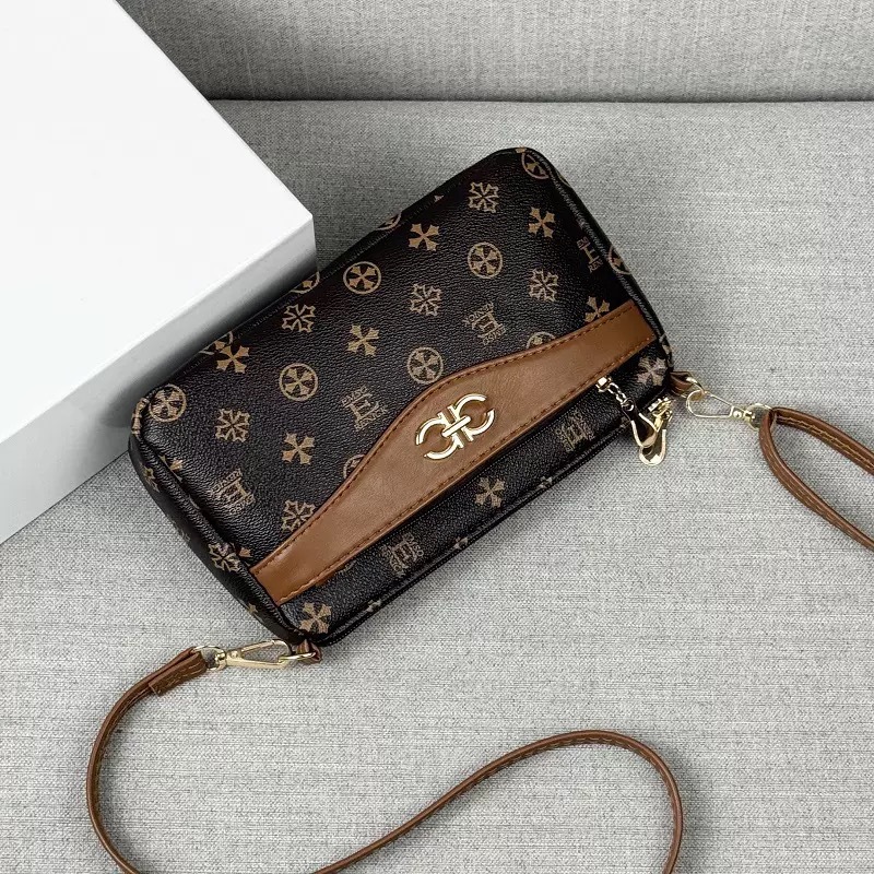 Guangzhou Hengli 2024 nuevo bolso de mensajero transfronterizo bolso casual de mediana edad bolso de teléfono móvil para mujer bolso de venta caliente bolso de hombro