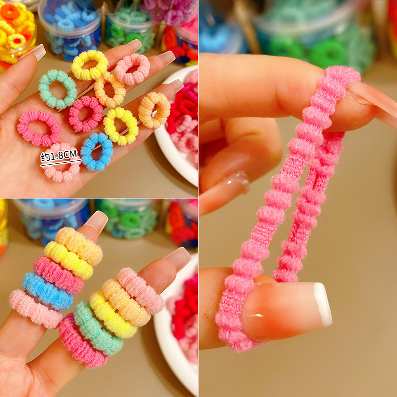 Color de alta elasticidad pequeña toalla anillo de niños no lastimar cabello cuerdas de correa de cabello inns de alto valor al por mayor anillo de cabello