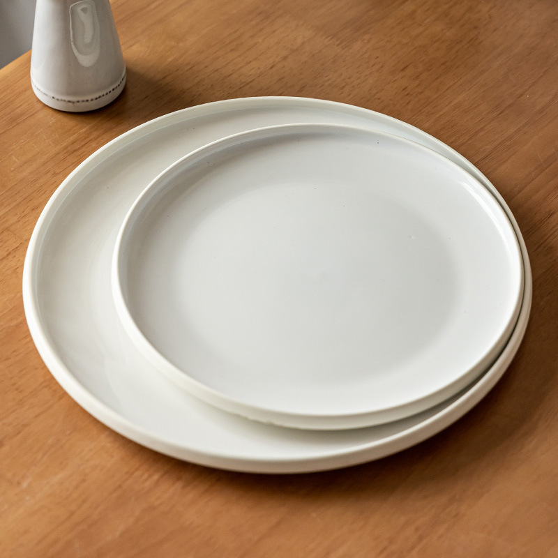 Plato plano de cerámica de estilo nórdico Plato redondo exquisito para el hogar Plato de carne occidental Plato de pasta Plato de vajilla Plato al por mayor