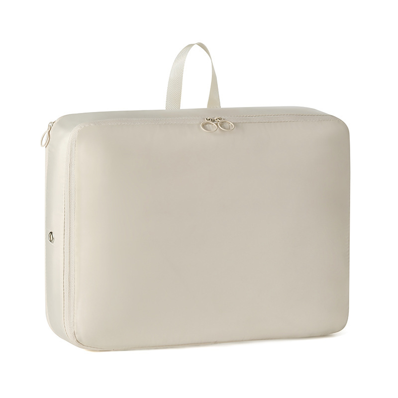 베이지·다운 재킷 압축