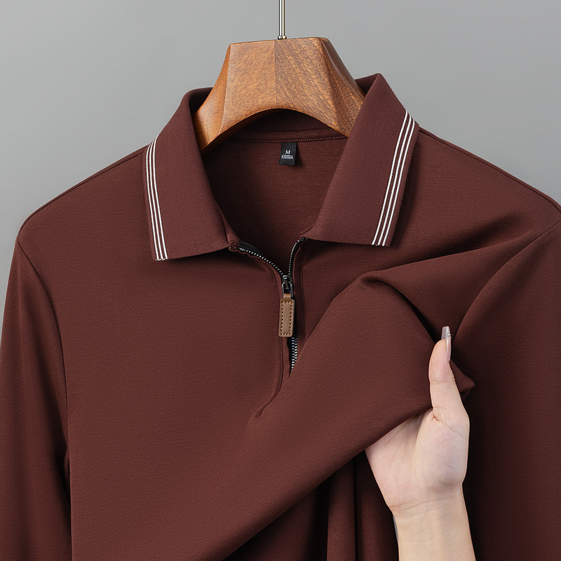 Half-zip long-sleeve polo shirt with striped collar, made of durable and wrinkle-resistant fabric, perfect for spring and autumn, suitable for work, casual wear, and easy to match with any outfit Half-zip long-sleeve polo shirt with striped collar, made of durable and wrinkle-resistant fabric, perfect for spring and autumn, suitable for work, casual wear, and easy to match with any outfit