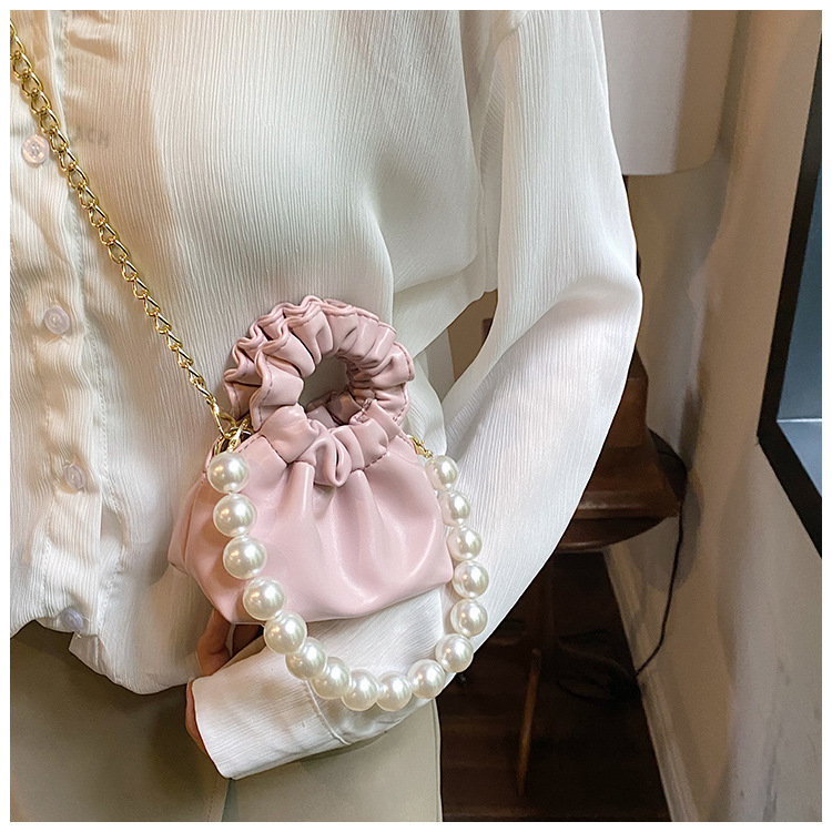 255g Weight Beading, Pearls Fashion Element Clasp Frame Closure Type Top Handle, Chain Strap Type Crossbody Bag Bags Type Casual, Daily, Shopping Occasion Pu Leather Material Solid Color Pattern All Seasons Season Kid'S Gender Cute Style Bucket Shape Kid'S Pu Leather Solid Color Cute Beading Pearls Bucket Clasp Frame Crossbody Bag 70