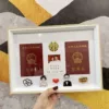 Wedding dress for women + men in suits and glasses, marriage certificate photo frame