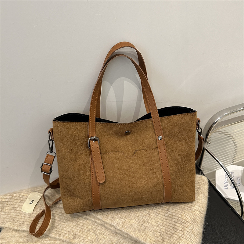 Nueva textura retro bolso de mujer extranjero empalme esmerilado simple mochila de hombro de gran capacidad de transporte