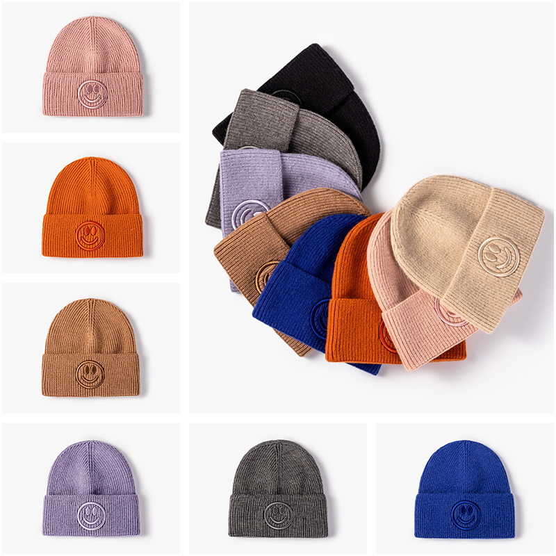 Hombres y mujeres del mismo estilo coreano sombrero de invierno y otoño moda versátil sombrero de punto sonriente sombrero de lana caliente fábrica personalizada
