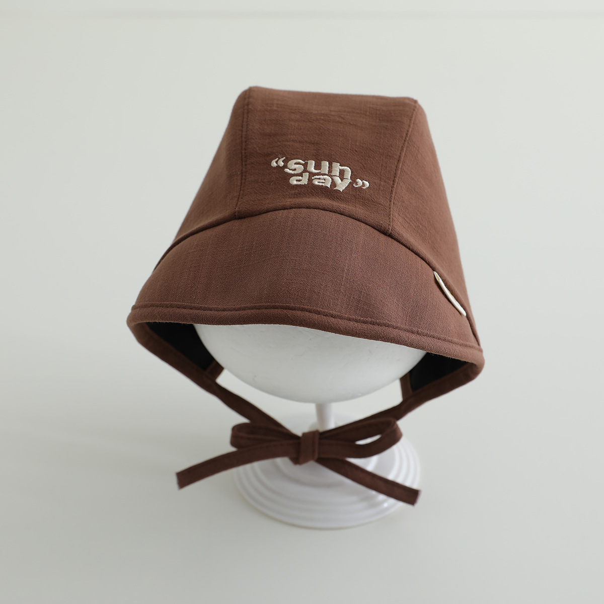 Sombrero para bebés primavera y otoño delgado correa sólida coreana Baotou sombrero de corte sombrero de sombra de sol recién nacido puerta de chimenea sombrero de neumático marea