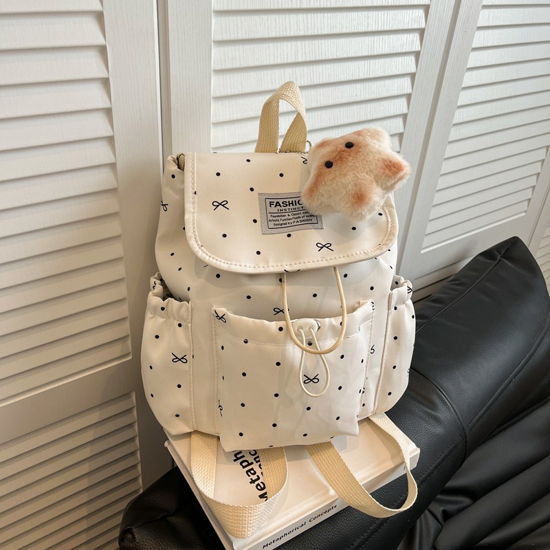 Mochila de la atmósfera pequeña onda punto arco de cuerda de dibujo simple mochila de viajes de viajes de viajes de la universidad pequeña mochila de mujeres