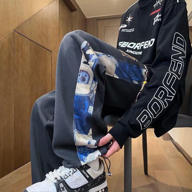 Pantalones de oso de marea nacional de primavera y otoño de los hombres marca de moda recta suelta pierna ancha 2025 nueva tendencia pantalones casuales de todo fósforo