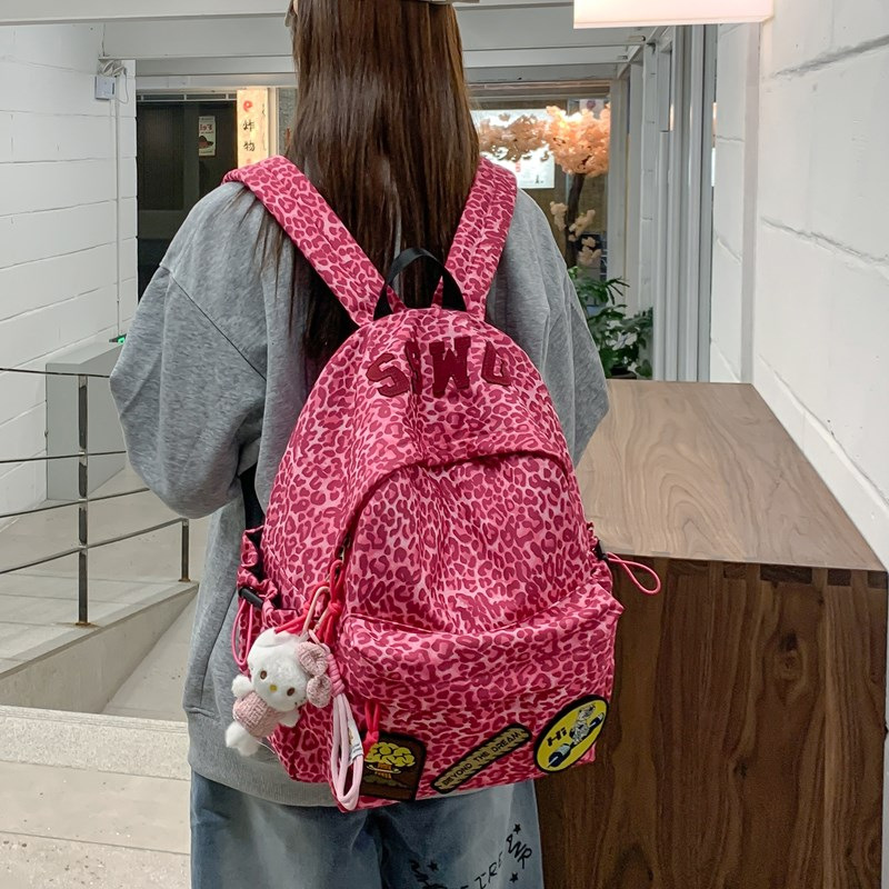 Mochila transfronteiriça de novo produto com estampa de leopardo, grande capacidade, versão coreana, feminina, estudante do ensino médio, mochila casual de nicho