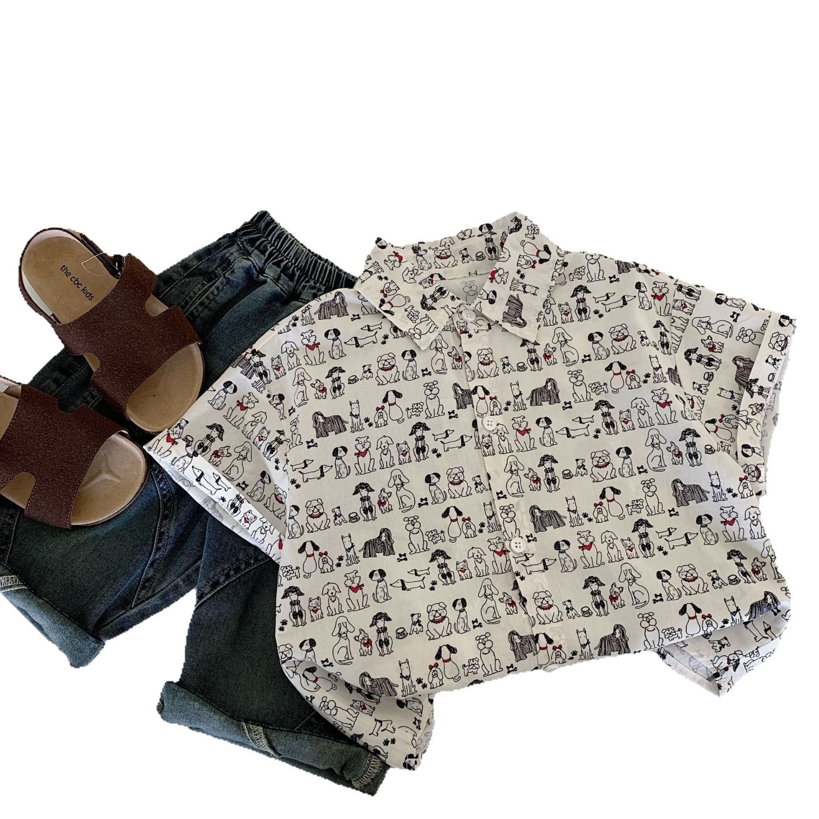 Camisa de manga corta para niños Maibao 2025 verano nuevo estilo coreano niño camisa de cachorro de impresión completa niño verano al por mayor