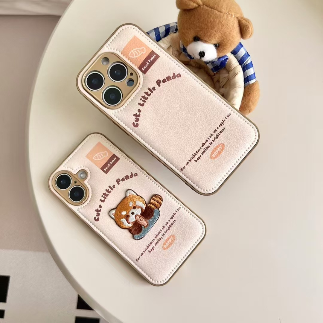 Cachorro bordado de dibujos animados para iPhone15/16 chaqueta de plumón funda para teléfono móvil Apple 14promax otoño e invierno 13p mujer