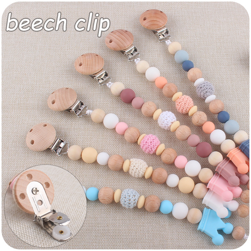 Nuevo bebé suministros Beech chupete clip DIY corona de dibujos animados mordedura de silicona molares chupete cadena anti-caída