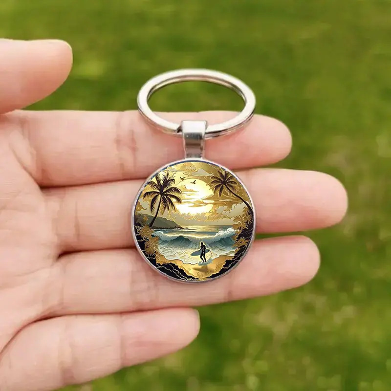 Ventas transfronterizas calientes bajo el crepúsculo de la playa patrón de tema colgante de vidrio redondo llavero directo de fábrica