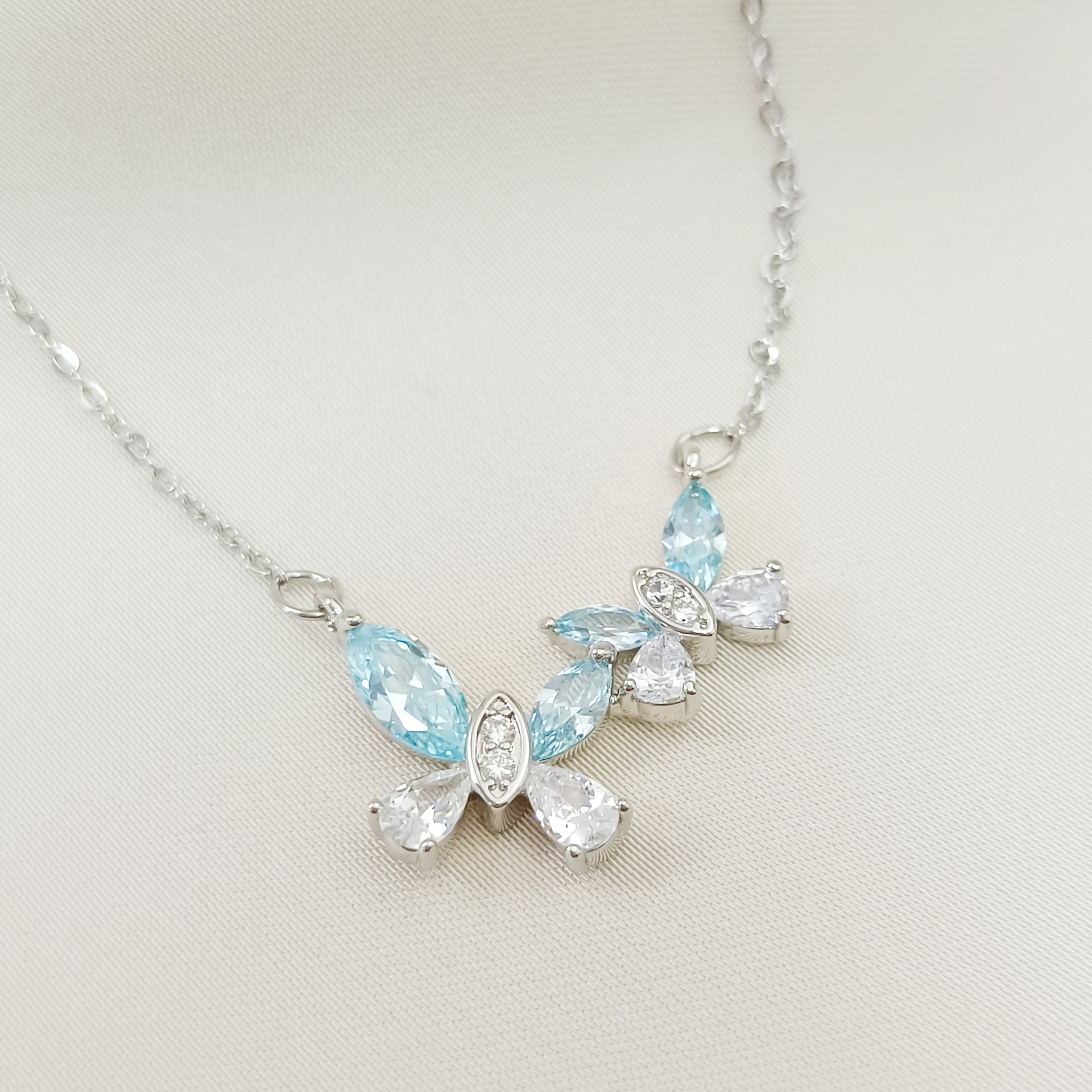 Blue necklace with zircon