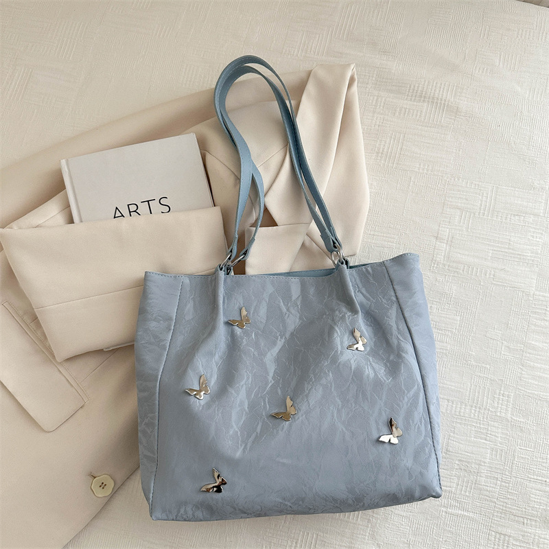 Bolso de viaje popular de gran capacidad de este año 2024 nuevo arco de moda bolso de hombro de mujer bolso universal