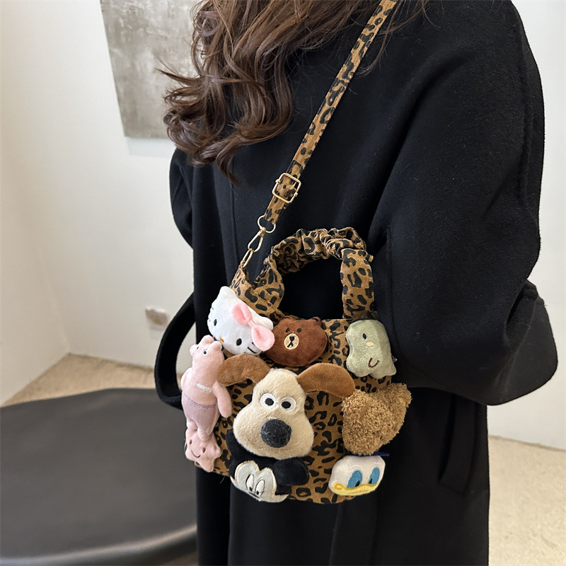 Cartoon puppy bolso de muñeca mujer 2024 nueva moda leopardo estampado bolso de mano bolso de lona versátil