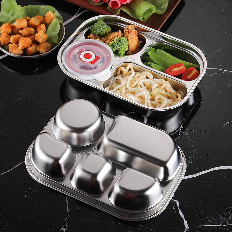 316ステンレス製の弁当箱のサラリーマンは食事を持っています。|undefined