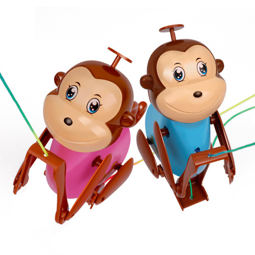 The little monkey who can climb the rope is a creative and interesting children's toy. The baby pulls the rope and the monkey climbs the rope.