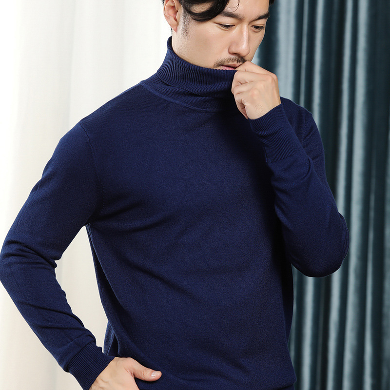秋冬の新型男性韓国版高襟のニットの純色のビジネス男性は大きいサイズのゆったりしたセーターを打ちます。
