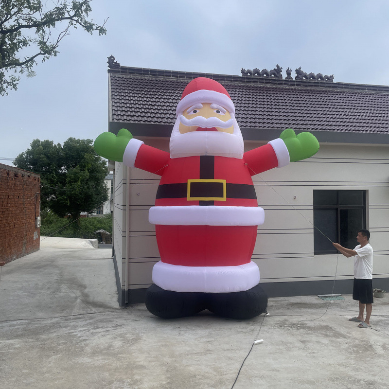Explosiones de venta super llamativa decoración inflable gigante de alto valor facial resistente al usuario exterior interior universal modelo de aire de Santa Claus