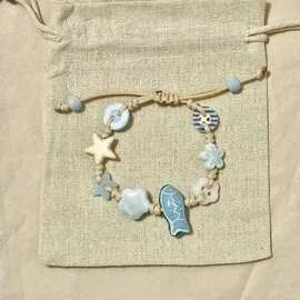 蓝色小鱼星星手链2024新款海洋生物设计感可爱少女高颜值纽扣手链