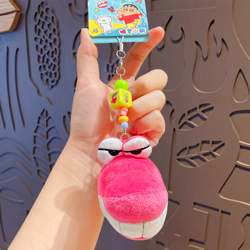 Crayons, mobile phone, pendant, cloth, doll, crocodile