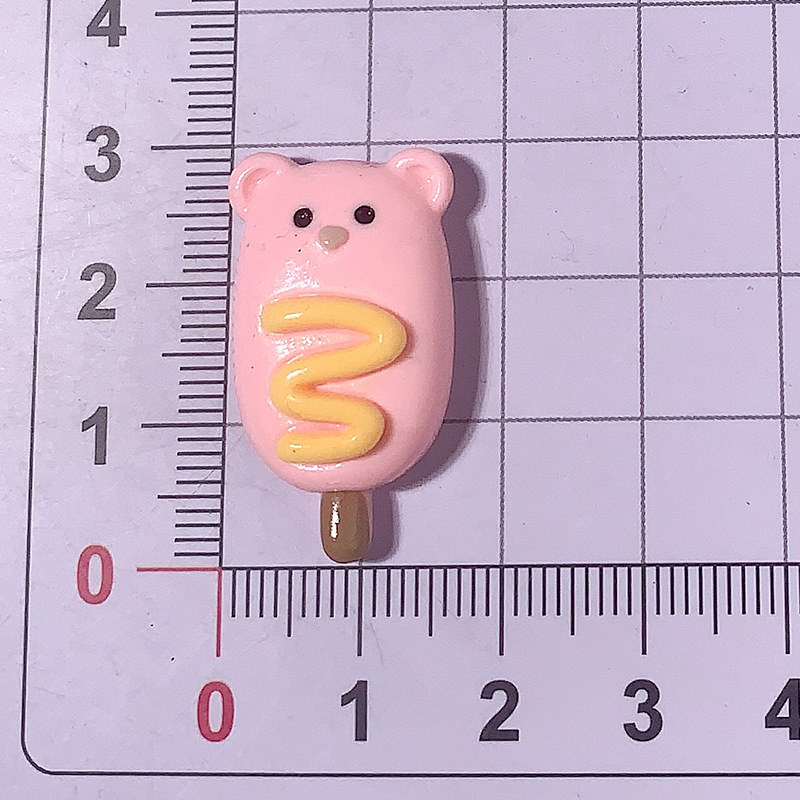 Caricatura brillante cara extraña comida DIY accesorios de resina joyas hechas a mano pinzas de pelo de casco de teléfono celular taza de agua tocado al por mayor