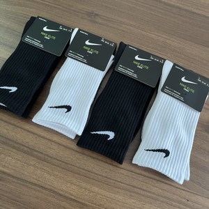 四季通用纯色高筒黑白独立包装加厚男女款苏万奈克对勾运动跑步袜