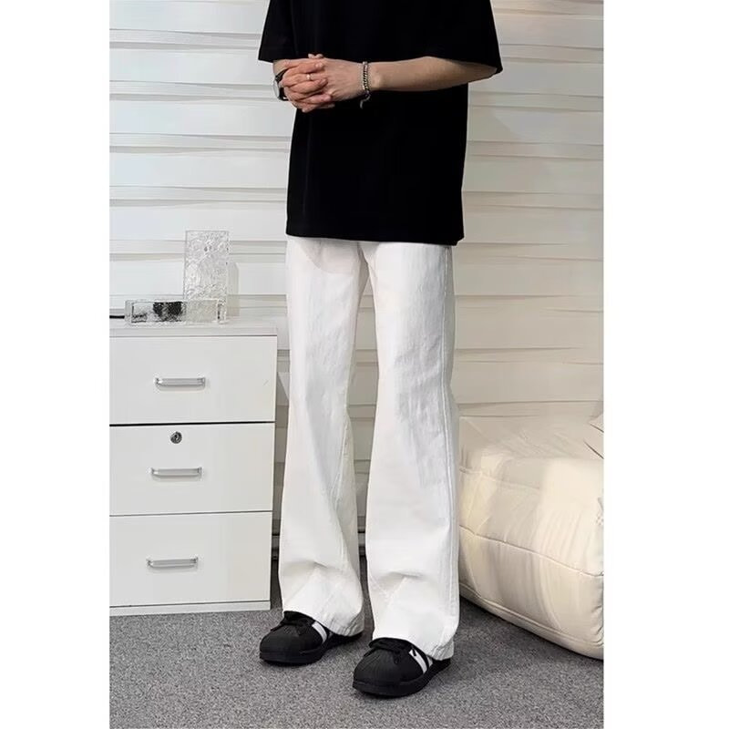 夏用の高級白ジーンズ、アメリカンバイブのマイクロフレアパンツ、男性用のゆったりとしたストレートレッグのトレンディなカジュアルパンツ|undefined